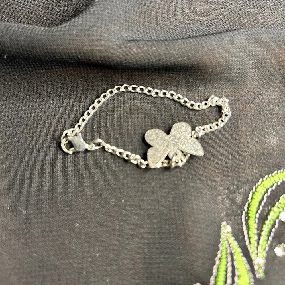 Cute unbranded Kids Silver Tone Metal Butterfly charm Bracelet.